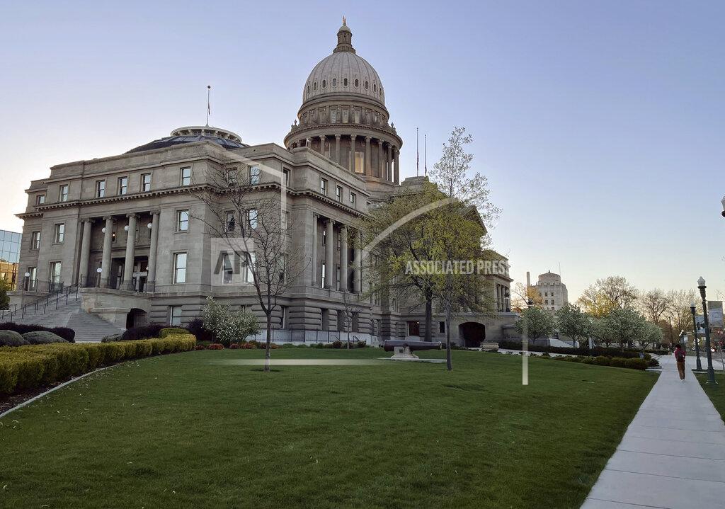 Keith Ridler The Idaho Statehouse is seen at sunrise on April 20, 2021, in Boise, Idaho. Mainstream and far-right Republicans are battling for control of the party and the state in the deeply conservative state. (AP Photo/Keith Ridler)