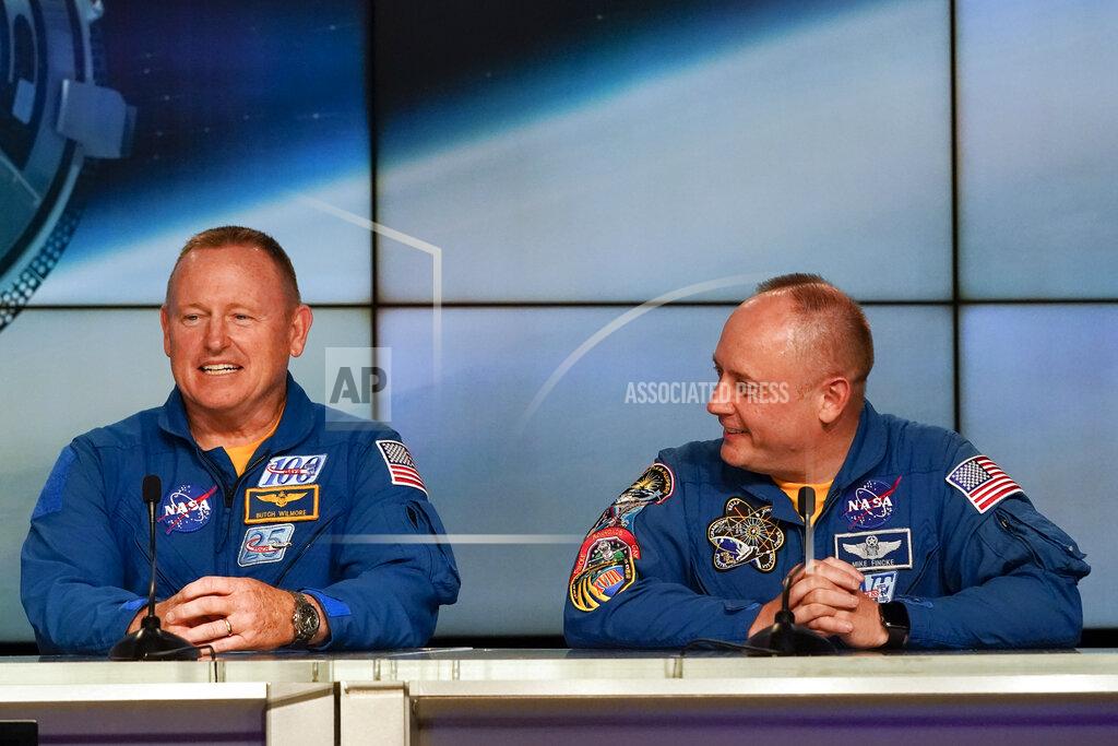 John Raoux NASA astronauts Butch Wilmore, left, and Mike Fincke answer questions during a news conference at the Kennedy Space Center in Cape Canaveral, Fla., Wednesday, May 18, 2022. (AP Photo/John Raoux)