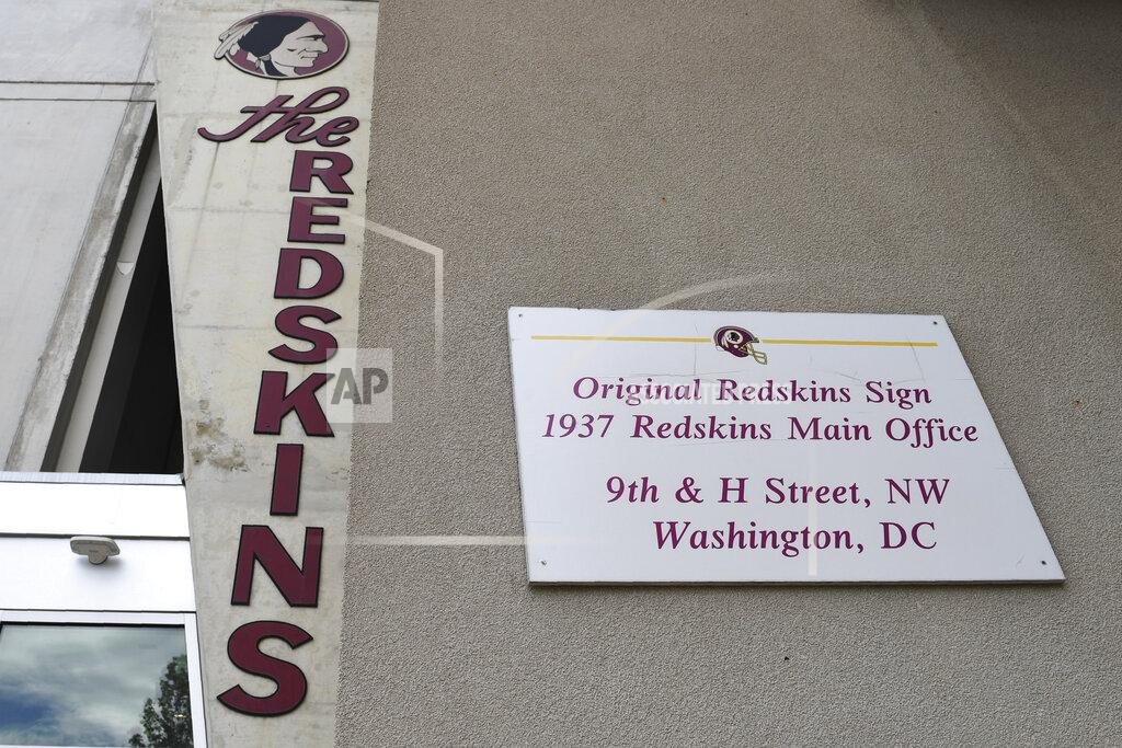 Susan Walsh Signs for the Washington Redskins are displayed outside FedEx Field in Landover, Md., Monday, July 13, 2020. The Washington NFL franchise announced Monday that it will drop the "Redskins" name and Indian head logo immediately, bowing to decades of criticism that they are offensive to Native Americans. (AP Photo/Susan Walsh)