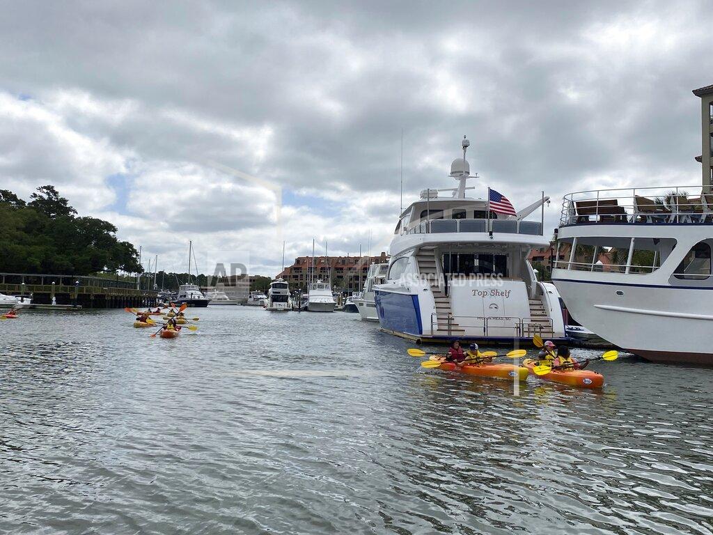 Sarah Haselhorst A group of Hilton Head Christian Academy making their way back from a kayaking excursion on Broad Creek where they learned about the environment around them Monday, May 9, 2022 on Hilton Head Island. (Sarah Haselhorst/The Island Packet via AP)