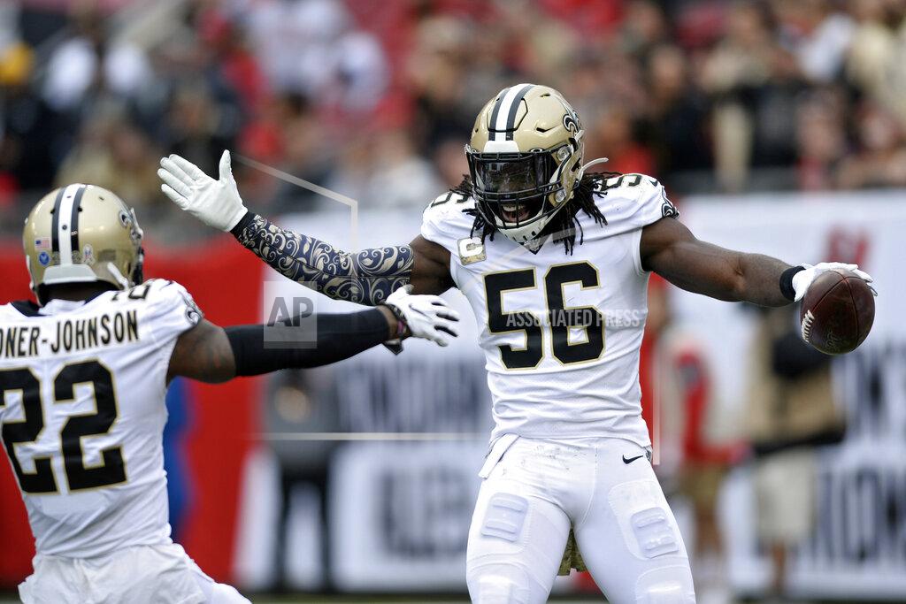 Jason Behnken New Orleans Saints outside linebacker Demario Davis (56) celebrates with defensive back Chauncey Gardner-Johnson (22) after Davis intercepted a pass by the Tampa Bay Buccaneers during the first half of an NFL football game Sunday, Nov. 17, 2019, in Tampa, Fla. (AP Photo/Jason Behnken)