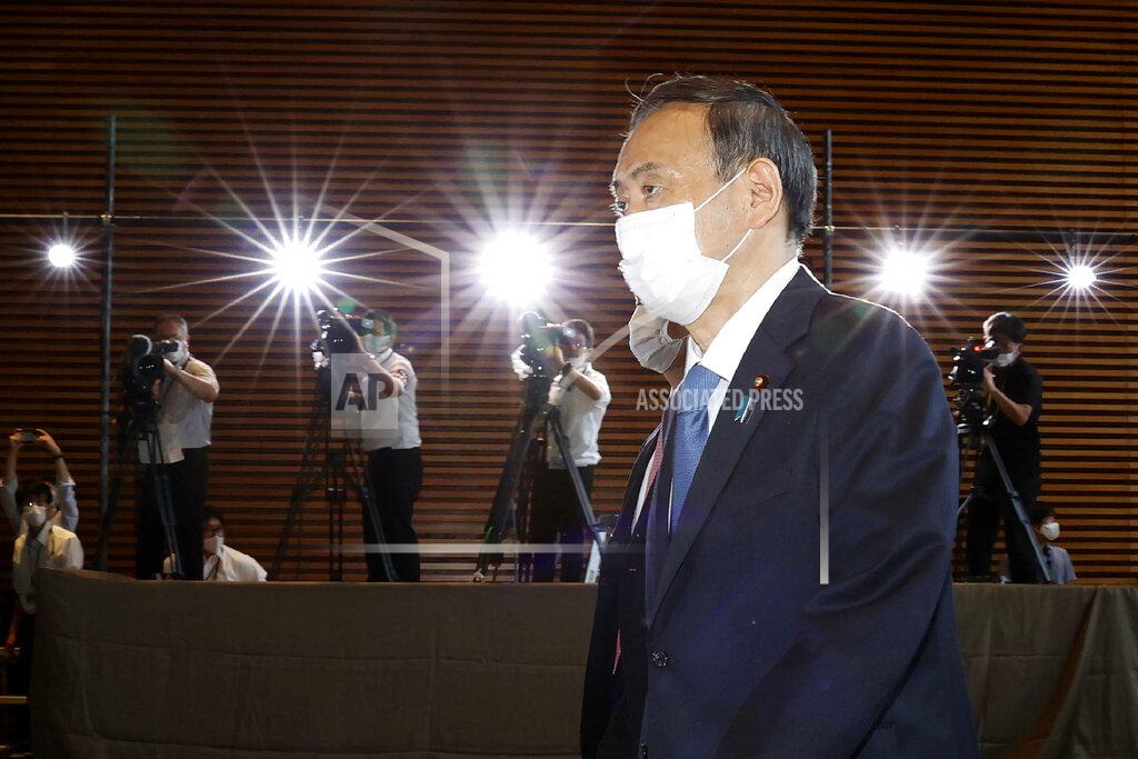 Shinji Kita FILE - In this Sept. 16, 2020, file photo, Yoshihide Suga arrives at the prime minister's office after being formally elected Japan's prime minister in a parliamentary vote in Tokyo. Japan's new Prime Minister Suga heads to Vietnam and Indonesia on Sunday, Oct. 18, 2020, on his first overseas foray since taking over from his former boss Shinzo Abe last month. (Shinji Kita/Kyodo News via AP, File)