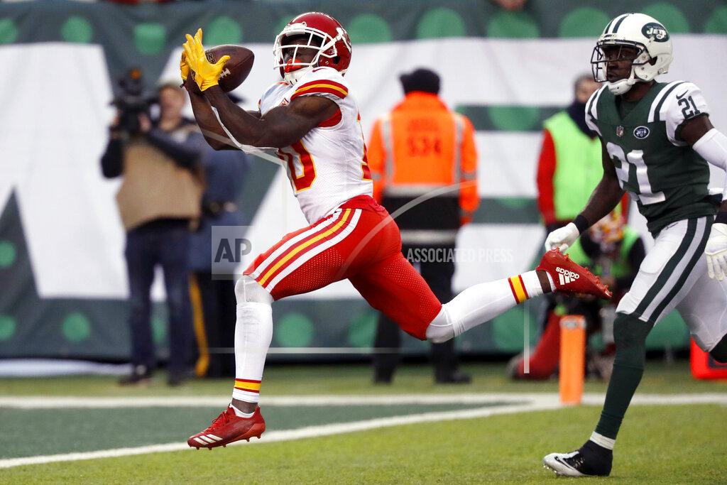 Julie Jacobson FILE - In this Dec. 3, 2017, file photo, Kansas City Chiefs' Tyreek Hill, left, scores a touchdown during the second half of an NFL football game against the New York Jets, in East Rutherford, N.J. The Colts-Chiefs playoff game Saturday is hardly short of offensive firepower, extending far beyond star quarterbacks Andrew Luck and Patrick Mahomes. (AP Photo/Julie Jacobson)