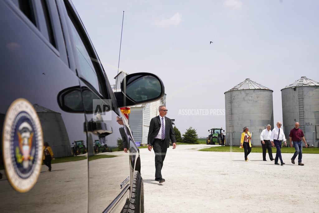 Andrew Harnik President Joe Biden walks with O'Connor Farms owner Jeff O'Connor, right, as Agriculture Secretary Tom Vilsack walks with Rep. Robin Kelly, D-Ill., at the farm Wednesday, May 11, 2022, in Kankakee, Ill. Biden visited the farm to discuss food supply and prices as a result of Putin's invasion of Ukraine. (AP Photo/Andrew Harnik)