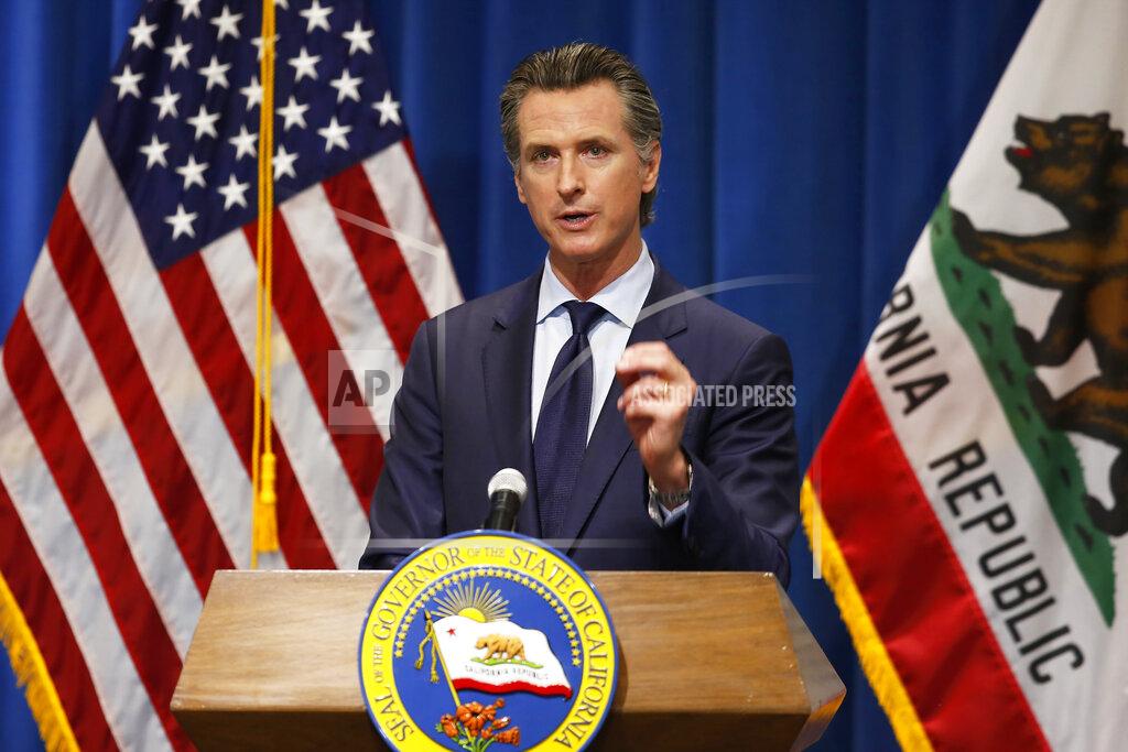 Rich Pedroncelli FILE - In this Thursday, May 14, 2020, file photo California Gov. Gavin Newsom discusses his revised 2020-2021 state budget during a news conference in Sacramento, Calif. Gov. Newsom signed a $202.1 billion state budget Monday, June 29, in Sacramento, Calif. The budget closes an estimated $54.3 billion deficit through a combination of spending cuts, internal borrowing and temporary tax increases on businesses. Like most states, California's deficit was driven by the economic downturn caused by the coronavirus. (AP Photo/Rich Pedroncelli, Pool, File)