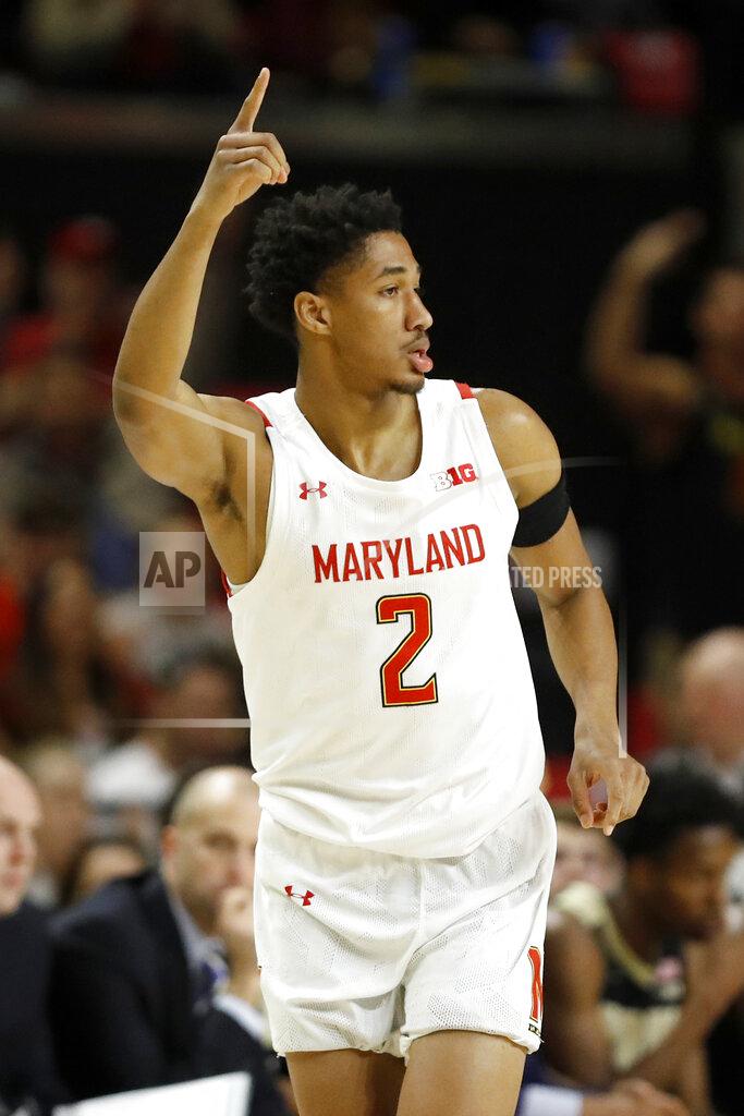 Julio Cortez Maryland guard Aaron Wiggins reacts after hitting a 3-pointer against Purdue during the first half of an NCAA college basketball game, Saturday, Jan. 18, 2020, in College Park, Md. (AP Photo/Julio Cortez)