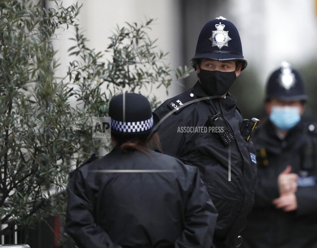 Alastair Grant Police stand guard outside the King Edward VII hospital In London, Monday, Feb. 22, 2021, where Britain's Prince Philip is being treated. Prince Philip, 99, was admitted to the hospital on Tuesday on the advice of his doctor in what Buckingham Palace described as “a precautionary measure.” (AP Photo/Alastair Grant)