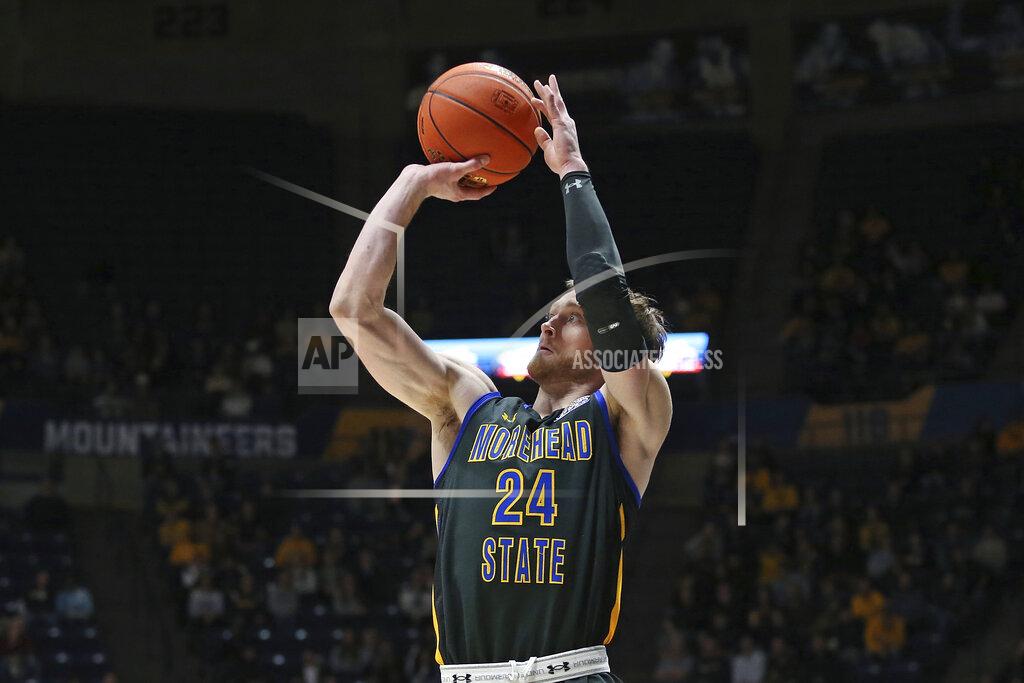 Kathleen Batten Morehead State guard Jake Wolfe (24) shoots during the first half of an NCAA college basketball game against West Virginia in Morgantown, W.Va., Tuesday, Nov. 15, 2022. (AP Photo/Kathleen Batten)