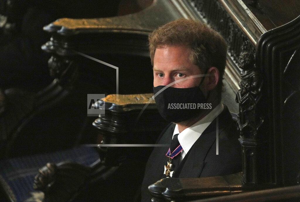 Yui Mok Prince Harry sits alone at St. George’s Chapel during the funeral for Prince Philip, at Windsor Castle, Windsor, England, Saturday April 17, 2021. Prince Philip died April 9 at the age of 99 after 73 years of marriage to Britain's Queen Elizabeth II. (Yui Mok/Pool via AP)