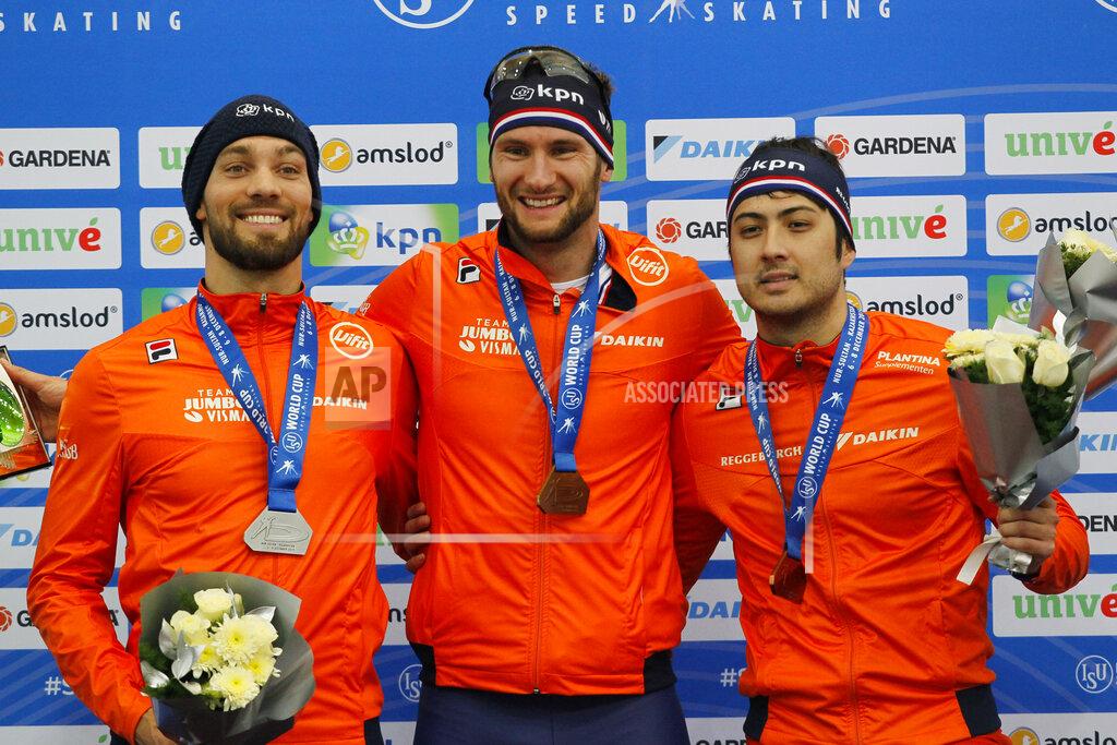 Stas Filippov FILE - From left to right, Netherlands' silver medalist Kjeld Nuis, gold medalist Thomas Krol and bronze medalist Kai Verbij pose during a medal ceremony after the men 1000-meter race of the speedskating World Cup at the Alau Ice Palace in Nur-Sultan, Kazakhstan, Dec. 7, 2019. Krol believed he was going to the Olympics four years ago. The speedskater finished third at the Dutch trials, and then politics intervened. The national federation named Verbij to the team for Pyeongchang. Verbij was injured at the trials and unable to compete in the 1,000 meters, but he was chosen over Krol. (AP Photo/Stas Filippov, File)