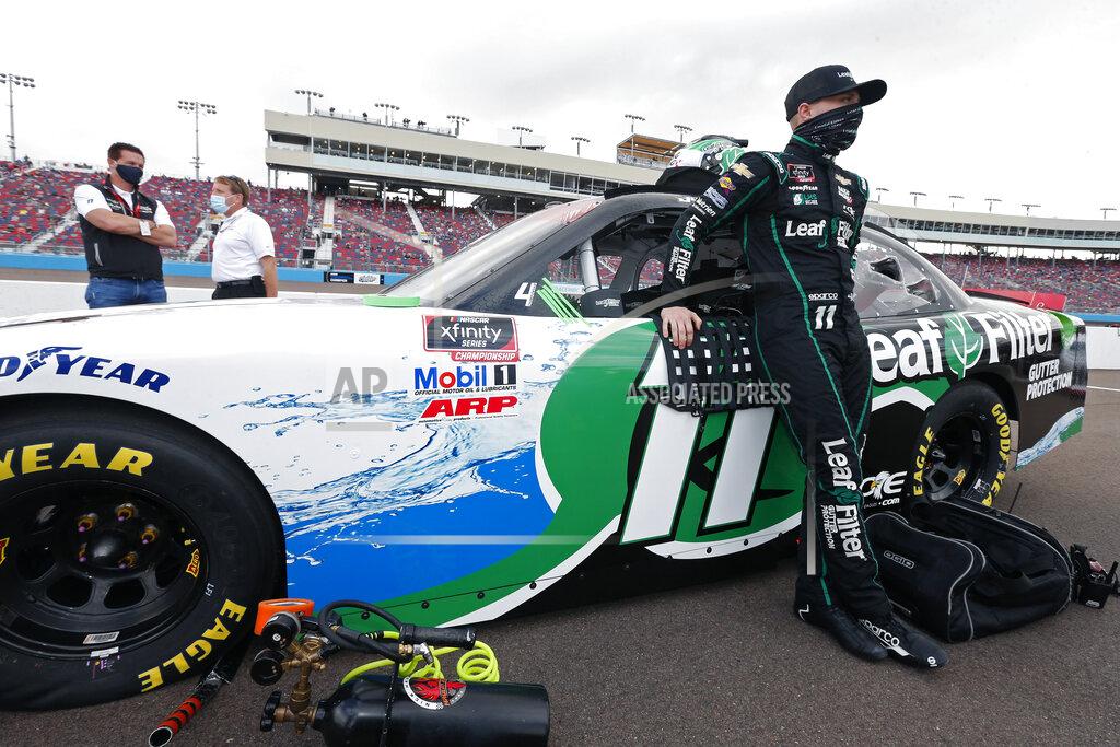 Ralph Freso Justin Haley stands with his race car on pit road prior to the NASCAR Xfinity Series auto race at Phoenix Raceway, Saturday, Nov. 7, 2020, in Avondale, Ariz. (AP Photo/Ralph Freso)