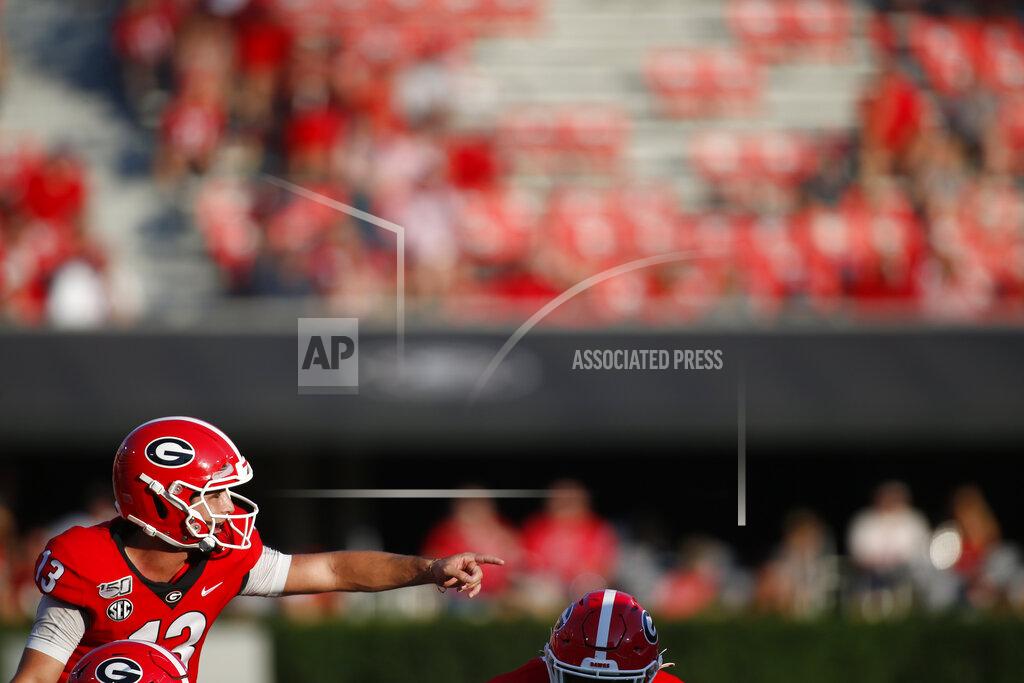 Georgia quarterback Stetson Bennett (13) calls out before running a play in the second half of an NCAA football game between Georgia and Murray State in Athens, Ga., on Saturday, Sept. 7, 2019. Georgia won 63-17. (Joshua L. Jones/Athens Banner-Herald via AP)