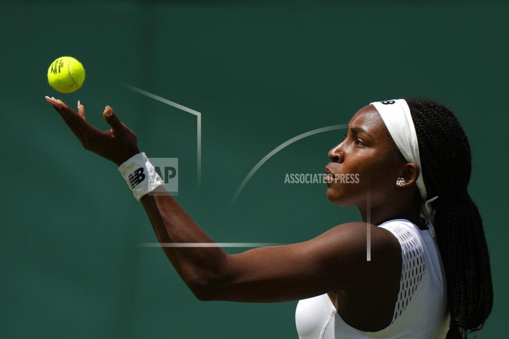 Alastair Grant Coco Gauff of the US serves to Romania's Elena-Gabriela Ruse during their singles tennis match on day two of the Wimbledon tennis championships in London, Tuesday, June 28, 2022. (AP Photo/Alastair Grant)