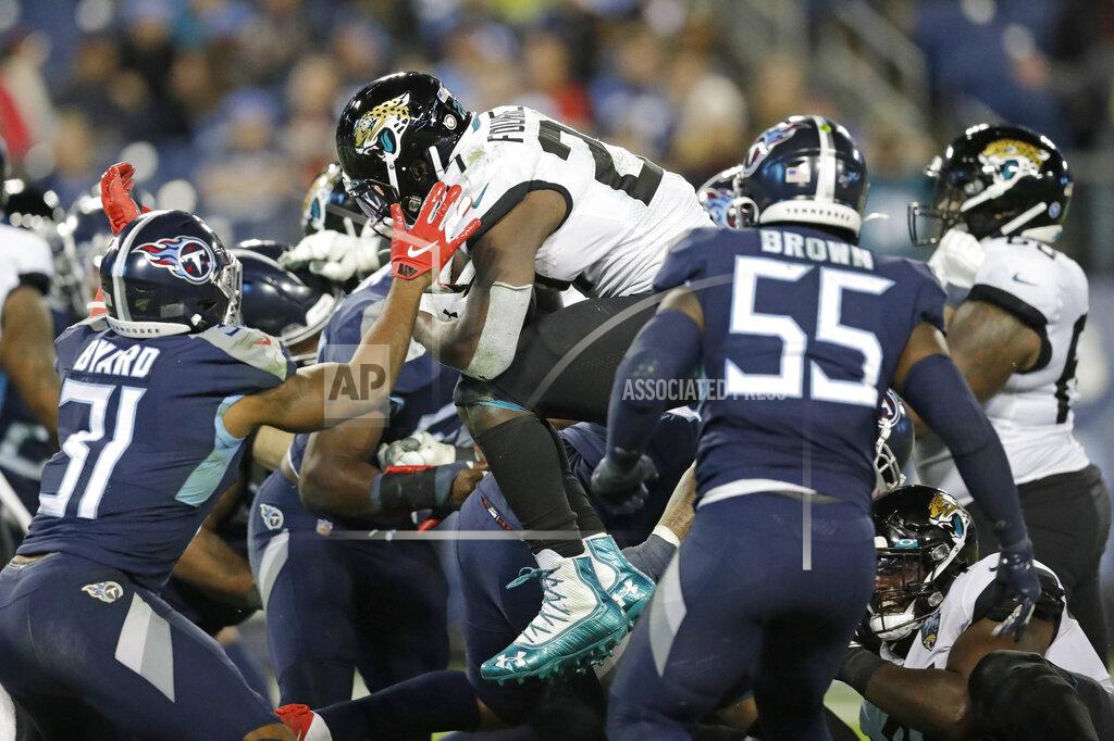 James Kenney Jacksonville Jaguars running back Leonard Fournette (27) leaps over the goal line as he scores a touchdown on a 1-yard run against the Tennessee Titans in the second half of an NFL football game Sunday, Nov. 24, 2019, in Nashville, Tenn.(AP Photo/James Kenney)