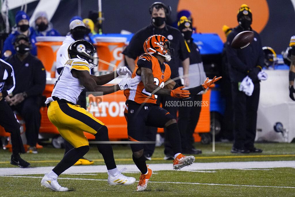 Michael Conroy Cincinnati Bengals' Darius Phillips (23) breaks up a pass intended for Pittsburgh Steelers' James Washington (13) during the first half of an NFL football game, Monday, Dec. 21, 2020, in Cincinnati. (AP Photo/Michael Conroy)