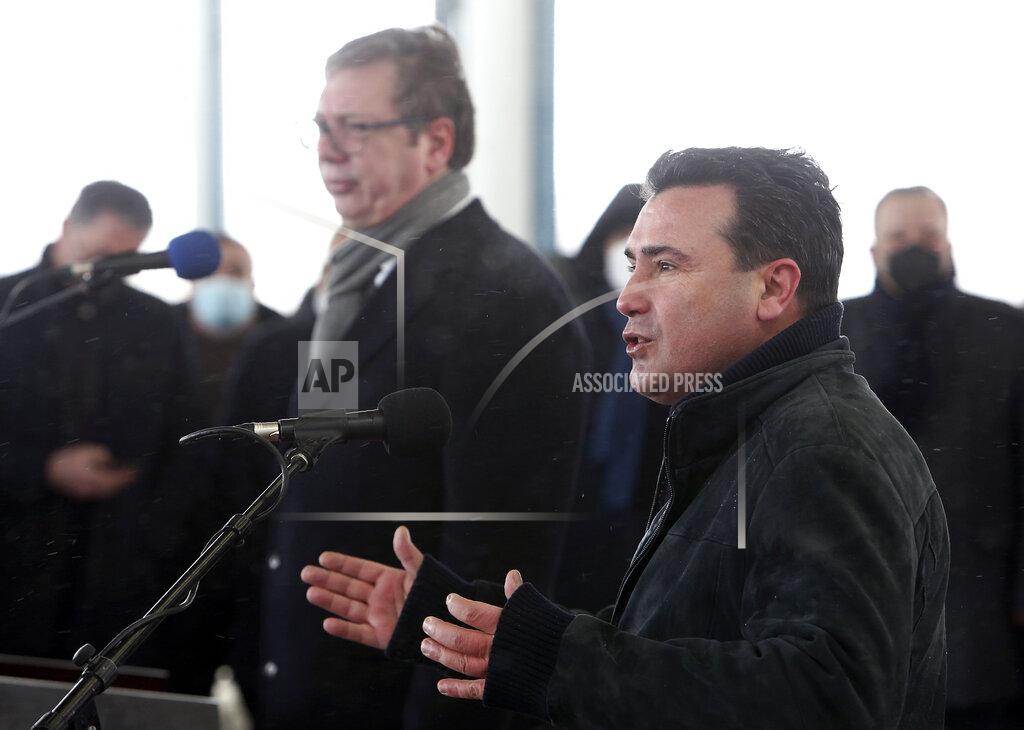 Boris Grdanoski North Macedonia's Prime Minister Zoran Zaev, right, talks for the media on a news conference with Serbia's President Aleksandar Vucic, left, during a handover of COVID-19 vaccines, at the border crossing Tabanovce, between North Macedonia and Serbia, on Sunday, Feb. 14, 2021. Serbia which has launched a successful vaccination campaign has donated some 8,000 doses of Pfizer COVID-19 shots to North Macedonia which is yet to deliver its first shots. (AP Photo/Boris Grdanoski)