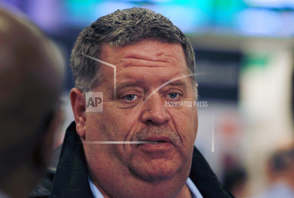 Garry Jones FILE - In this May 3, 2017 file photo, trainer Dale Romans talks about his Kentucky Derby entrant, J Boys Echo, drawing post position No. 13 for Saturday's race at Churchill Downs in Louisville, Ky. The Trump administration’s immigration squeeze and the hardships caused by the coronavirus pandemic threaten to leave the horse racing industry short of workers, racing officials warn as they prepare for a reconfigured Kentucky Derby.(AP Photo/Garry Jones)