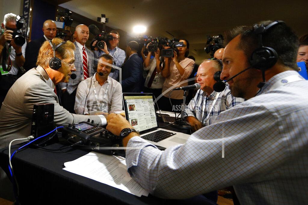 Butch Dill Alabama head coach Nick Saban, left, visits Radio Row during the NCAA college football Southeastern Conference Media Days, Wednesday, July 17, 2019, in Hoover, Ala. (AP Photo/Butch Dill)