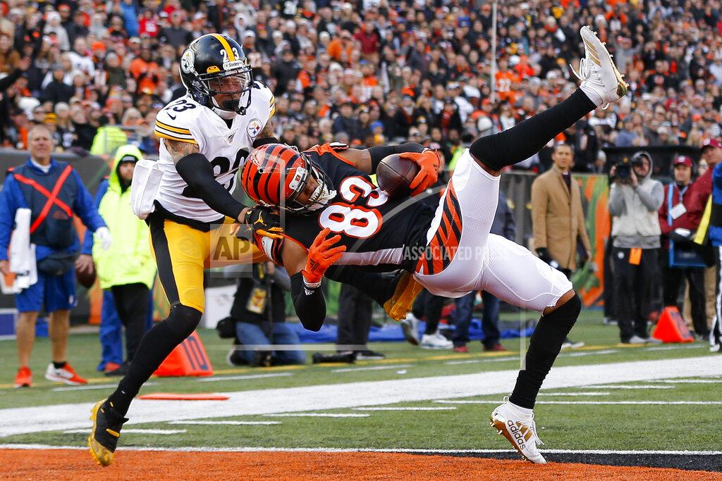 Frank Victores Cincinnati Bengals wide receiver Tyler Boyd (83) catches a touchdown pass against Pittsburgh Steelers cornerback Joe Haden (23) during the first half an NFL football game, Sunday, Nov. 24, 2019, in Cincinnati. (AP Photo/Frank Victores)