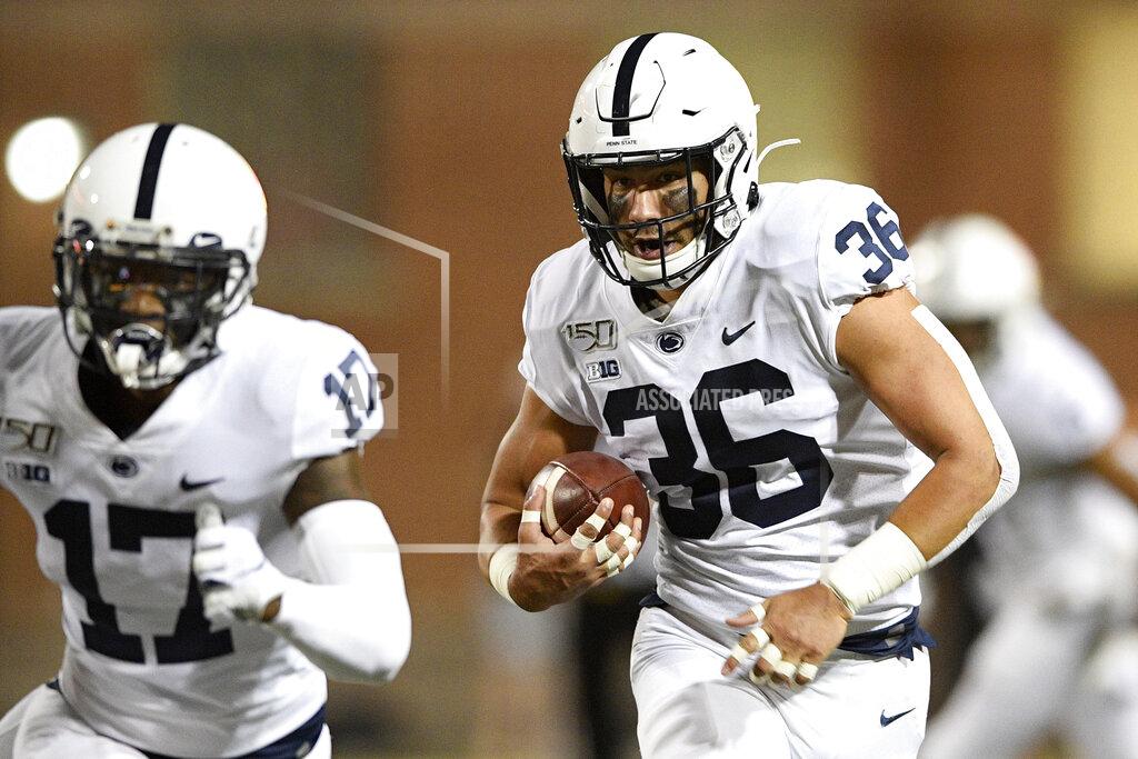 Nick Wass Penn State linebacker Jan Johnson (36) runs with the ball after he intercepted it during the first half of an NCAA college football game against Maryland, Friday, Sept. 27, 2019, in College Park, Md. (AP Photo/Nick Wass)