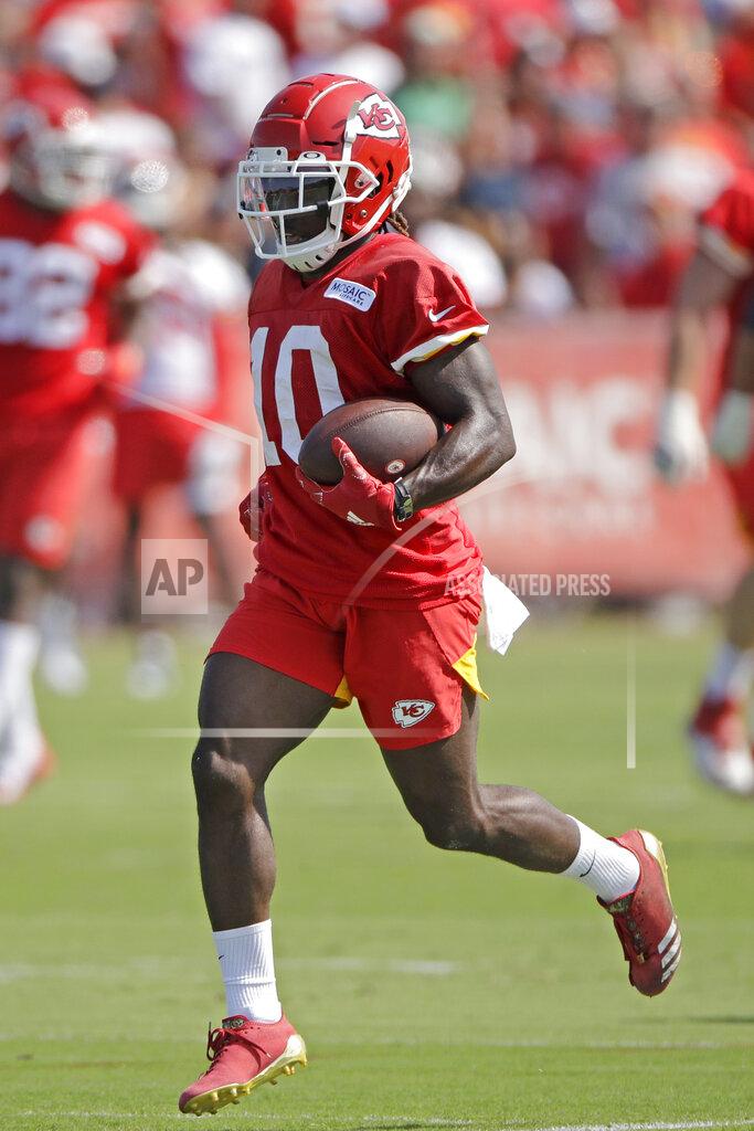 Charlie Riedel Kansas City Chiefs wide receiver Tyreek Hill runs the ball during NFL football training camp Saturday, July 27, 2019, in St. Joseph, Mo. (AP Photo/Charlie Riedel)