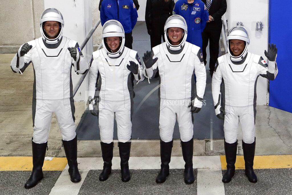 Uncredited The Crew Dragon space capsule astronauts, from front left, European Space Agency astronaut Thomas Pesquet, NASA astronaut Megan McArthur, NASA astronaut Shane Kimbrough and Japan Aerospace Exploration Agency astronaut Akihiko Hoshide leave the Operation and Checkout Building on their way to board the capsule for a mission to the International Space Station at the Kennedy Space Center in Cape Canaveral, Fla., Friday, April 23, 2021. (AP Photo/John Raoux)