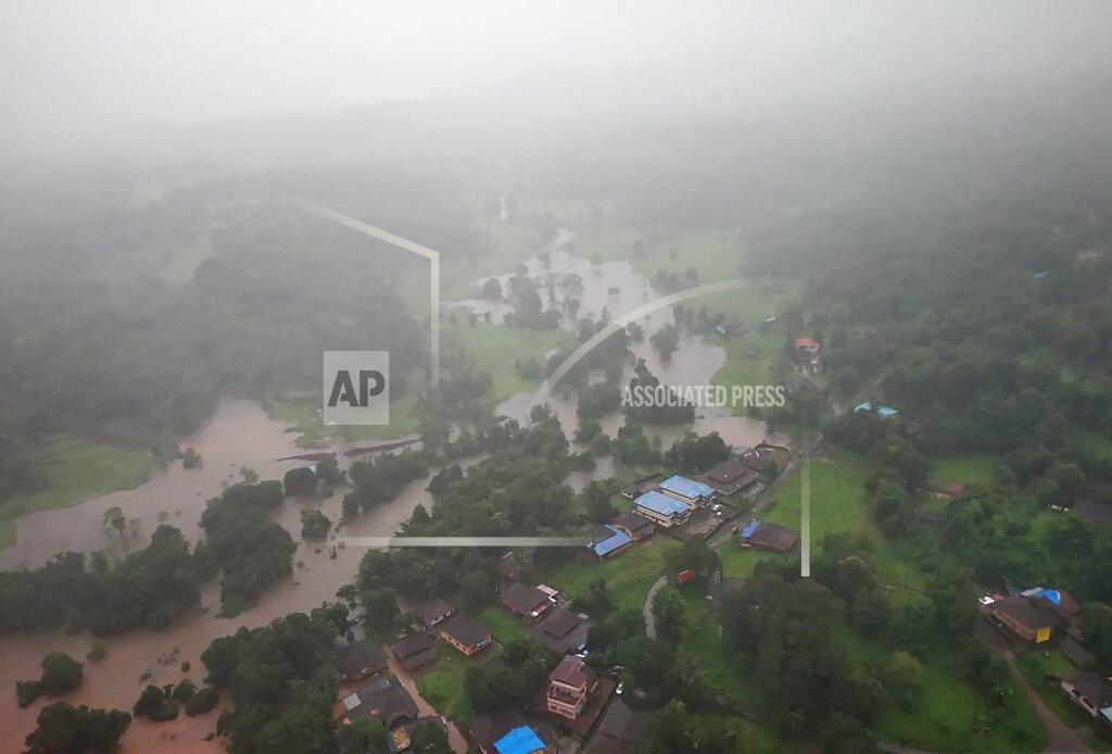 Uncredited This photograph provided by Indian Air Force shows flooding in Ratnagiri district, in the western Indian state of Maharashtra, Thursday, July 22, 2021. Landslides triggered by heavy monsoon rains hit parts of western India, killing at least five people and leading to the overnight rescue of more than 1,000 other people trapped by floodwaters, an official said Friday. (Indian Air Force via AP)