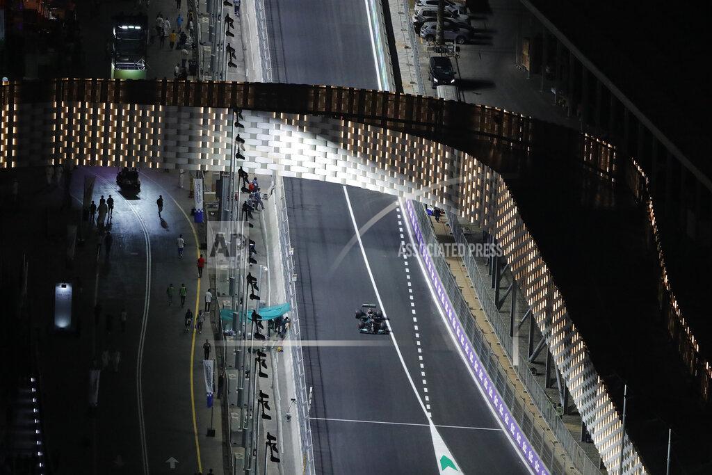 Amr Nabil Mercedes driver Lewis Hamilton of Britain in action during qualifying session for the Formula One Saudi Arabian Grand Prix in Jiddah, Saturday, Dec. 4, 2021. (AP Photo/Amr Nabil)