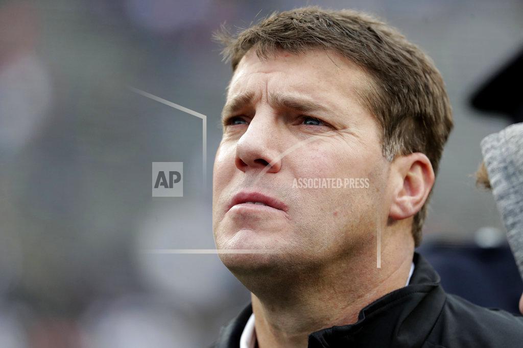 Julio Cortez Rutgers head coach Chris Ash looks on as his team sings the school's fight song after an NCAA college football game against Penn State, Saturday, Nov. 17, 2018, in Piscataway, N.J. Penn State won 20-7. (AP Photo/Julio Cortez)