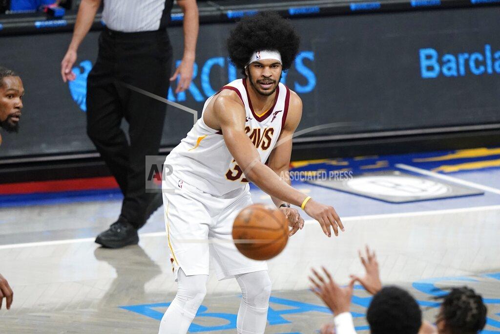 Frank Franklin Ii Cleveland Cavaliers' Jarrett Allen, center, passes to Isaac Okoro during the second half of an NBA basketball game against the Brooklyn Nets Sunday, May 16, 2021, in New York. (AP Photo/Frank Franklin II)