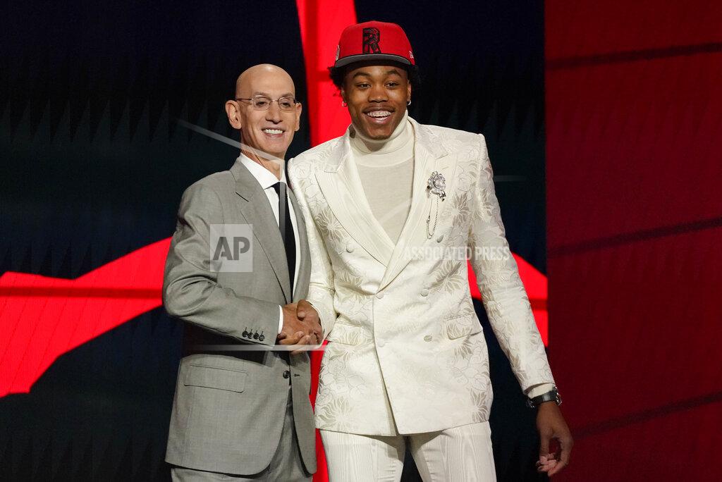 Corey Sipkin Scottie Barnes, right, poses for a photo with NBA Commissioner Adam Silver after being selected fourth overall by the Toronto Raptors during the first round of the NBA basketball draft, Thursday, July 29, 2021, in New York. (AP Photo/Corey Sipkin)