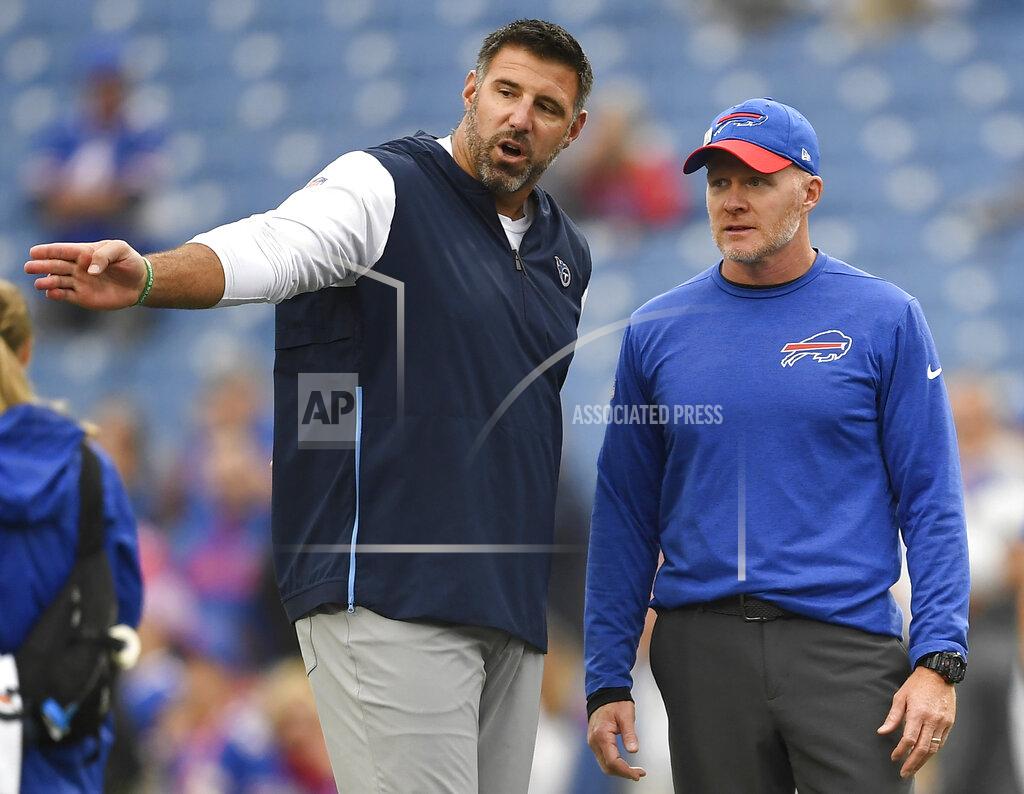 Adrian Kraus FILE - In this Sunday, Oct. 7, 2018, file photo, Tennessee Titans head coach Mike Vrabel, left, talks to Buffalo Bills head coach Sean McDermott prior to an NFL football game, in Orchard Park, N.Y. The NFL's ranks of undefeated teams should thin by one Tuesday night, Oct. 13, 2020, when the Buffalo Bills and Tennessee Titans finally meet in a rescheduled game. (AP Photo/Adrian Kraus, File)