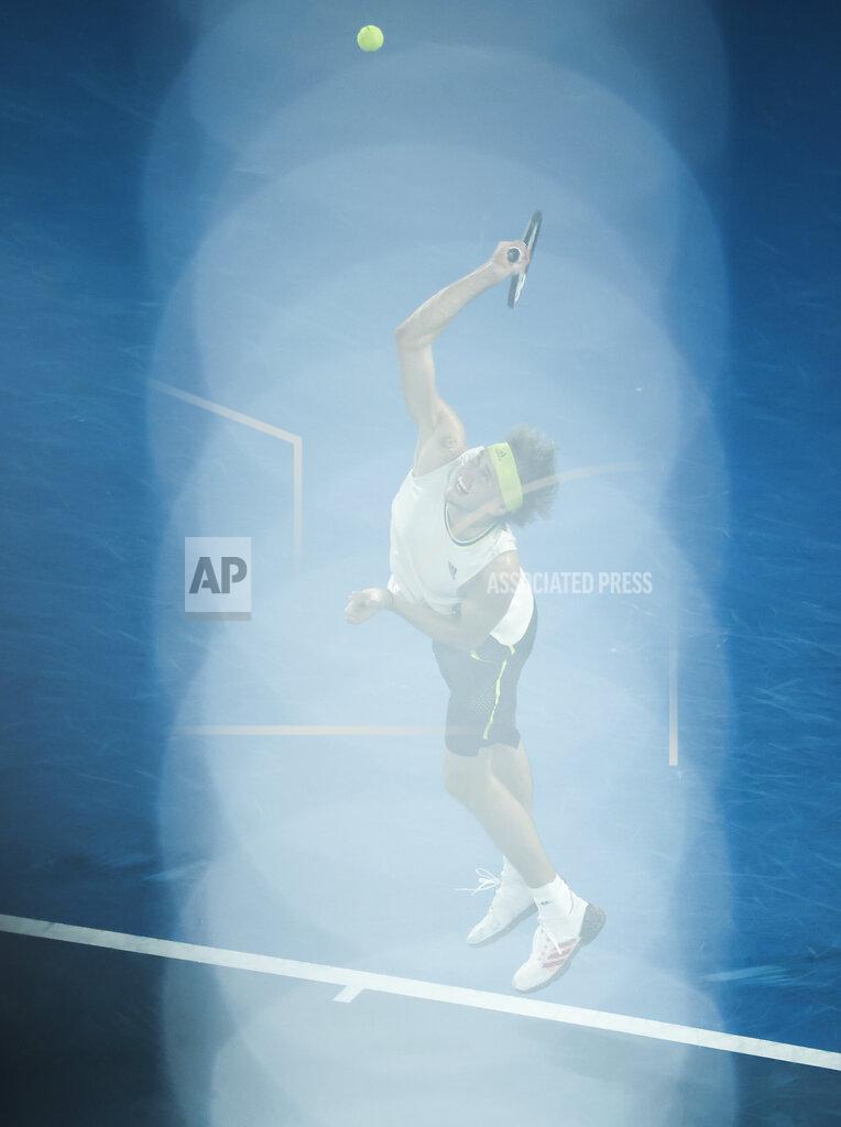 Hamish Blair Germany's Alexander Zverev serves to Serbia's Novak Djokovic during their quarterfinal match at the Australian Open tennis championship in Melbourne, Australia, Tuesday, Feb. 16, 2021.(AP Photo/Hamish Blair)