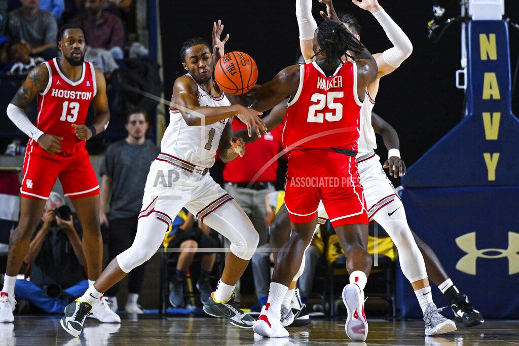 Terrance Williams Saint Joseph's guard Christian Winborne (1) steals the ball away from Houston forward Jarace Walker (25) during the second half of an NCAA college basketball game at the Veterans Classic, Friday, Nov. 11, 2022, in Annapolis, Md. (AP Photo/Terrance Williams)