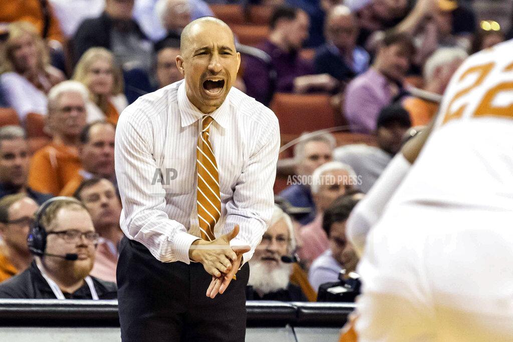 Lola Gomez Texas head coach Shaka Smart gives instructions to his team during an NCAA college basketball game against West Virginia in Austin, Texas, Monday, Feb. 24, 2020. (Lola Gomez/Austin American-Statesman via AP)