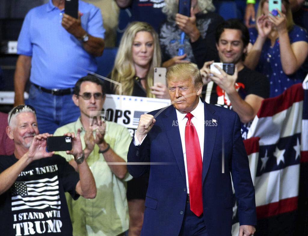 Matt Barnard President Donald Trump takes the stage at a campaign rally at the BOK Center in downtown Tulsa, Okla., on Saturday, June 20, 2020. (Matt Barnard/Tulsa World via AP)