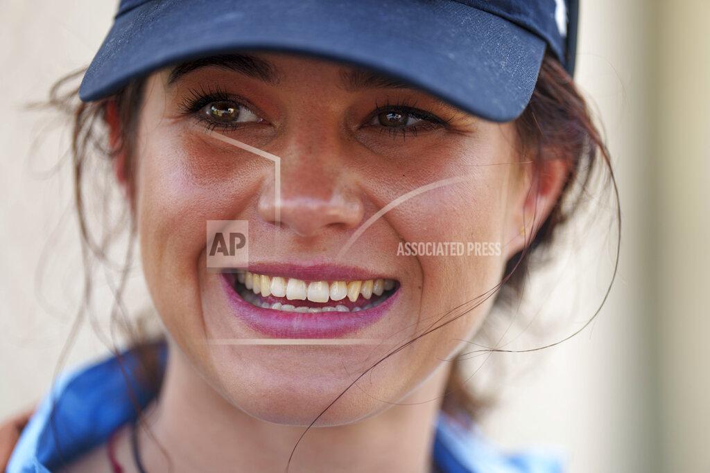 Niranjan Shrestha Ukrainian mountaineer Antonina Samoilova arrives at the airport after climbing Mount Everest, in Kathmandu, Nepal, Tuesday, May 17, 2022. Hundreds of climbers who scaled Mount Everest over the last few days taking advantage of favorable weather conditions have begun to return safely down the mountain. Samoilova said she hoped her achievement would call more attention to the war in her country. (AP Photo/Niranjan Shrestha)