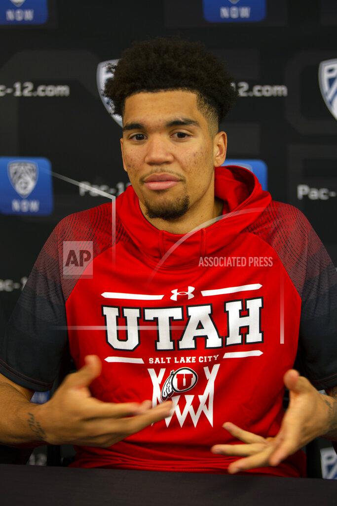 D. Ross Cameron Utah's Timmy Allen speaks during the Pac-12 NCAA college basketball media day, in San Francisco, Tuesday, Oct. 8, 2019. (AP Photo/D. Ross Cameron)