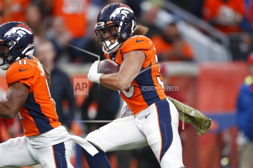 David Zalubowski Denver Broncos running back Phillip Lindsay (30) runs for a 30-yard touchdown against the Cleveland Browns during the second half of NFL football game, Sunday, Nov. 3, 2019, in Denver. (AP Photo/David Zalubowski)
