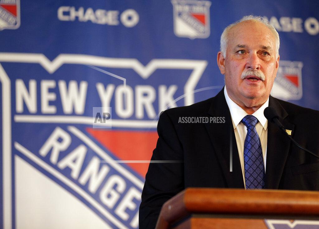 Seth Wenig FILE - In this Wednesday, May 22, 2019, file photo, new New York Rangers team president John Davidson speaks during a news conference in New York. The Rangers might be on the clock in owning the No. 1 pick in the NHL draft on Tuesday, Oct. 6, 2020. That, and the prospect of selecting Quebec star forward Alexis Lafreniere, doesn't mean the still-retooling Rangers will be anywhere closer to being a contender, team president John Davidson cautions.(AP Photo/Seth Wenig, File)