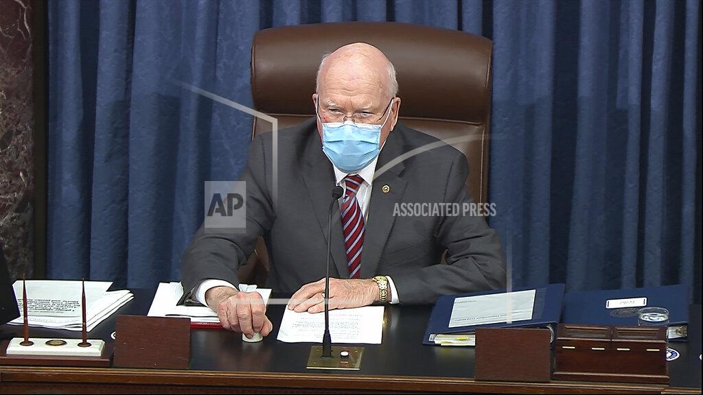 Uncredited In this image from video, Sen. Patrick Leahy, D-Vt., the president pro tempore of the Senate, who is presiding over the second impeachment trial of former President Donald Trump, opens the trial day in the Senate at the U.S. Capitol in Washington, Tuesday, Feb. 9, 2021. (Senate Television via AP)