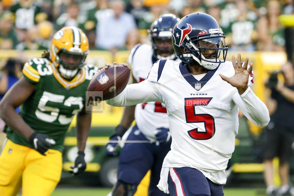 Mike Roemer Houston Texans' Tyrod Taylor drops back during the first half of a preseason NFL football game against the Green Bay Packers Saturday, Aug. 14, 2021, in Green Bay, Wis. (AP Photo/Mike Roemer)