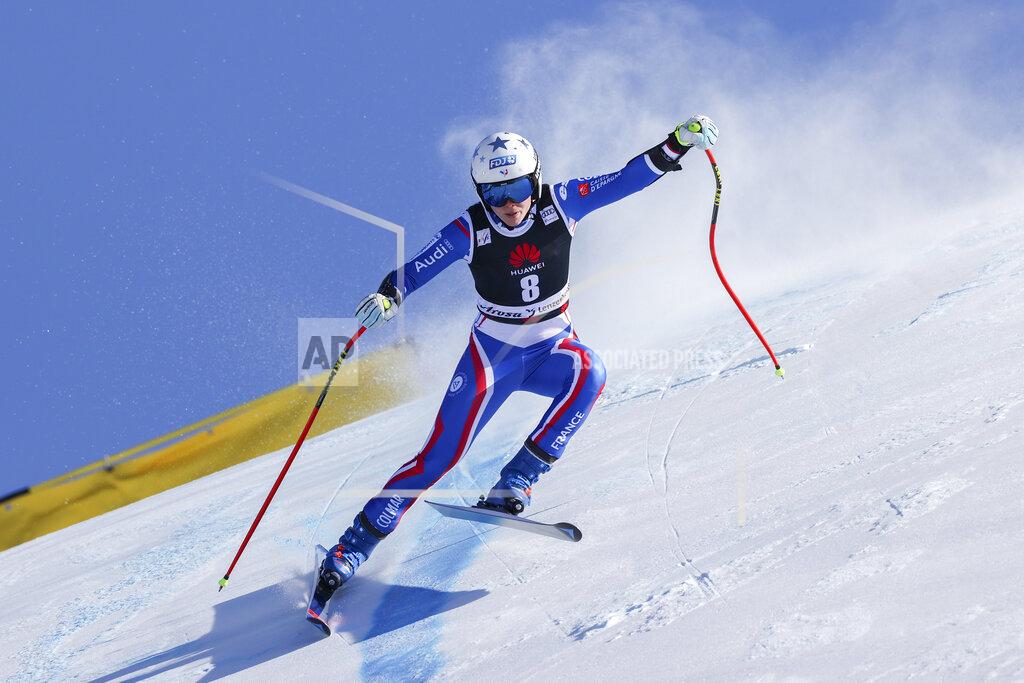 Alessandro Trovati France's Romane Miradoli speeds down the course during an alpine ski, women's World Cup super-G, in Lenzerheide, Switzerland, Saturday, March 5, 2022. (AP Photo/Alessandro Trovati)