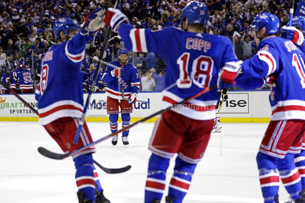 Adam Hunger New York Rangers defenseman K'Andre Miller (79) reacts toward teammates after scoring a goal against the Pittsburgh Penguins during the second period in Game 7 of an NHL hockey Stanley Cup first-round playoff series Sunday, May 15, 2022, in New York. (AP Photo/Adam Hunger)