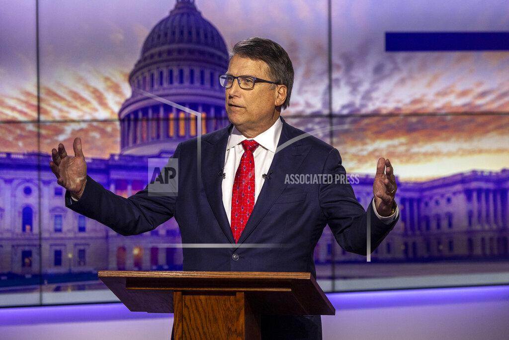 Travis Long Republican U.S. Senate candidate Pat McCrory answers a question during an hour-long debate moderated by Spectrum News political anchor Tim Boyum at the Spectrum News studio in Raleigh, N.C. Wednesday, April 20, 2022. (Travis Long/The News & Observer via AP)
