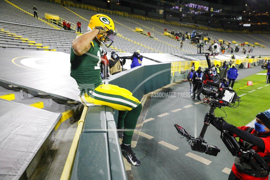 Mike Roemer Green Bay Packers' Allen Lazard celebrates his touchdown catch during the first half of an NFL football game against the Chicago Bears Sunday, Nov. 29, 2020, in Green Bay, Wis. (AP Photo/Mike Roemer)