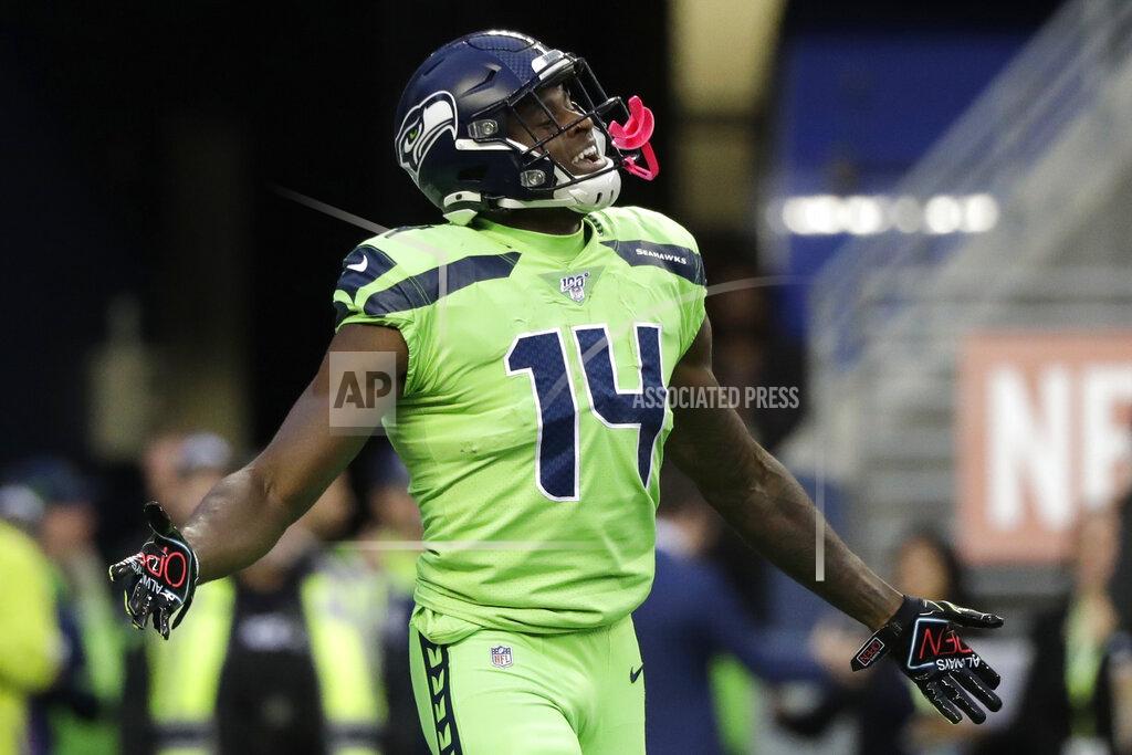 Elaine Thompson Seattle Seahawks wide receiver DK Metcalf celebrates his touchdown against the Los Angeles Rams during the first half of an NFL football game Thursday, Oct. 3, 2019, in Seattle. (AP Photo/Elaine Thompson)