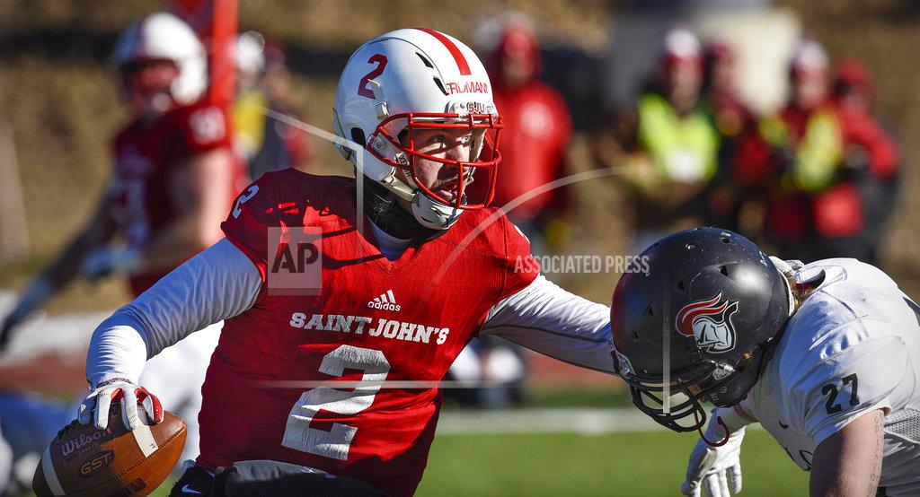 Dave Schwarz In this Nov. 17, 2018, file photo, St. John's quarterback Jackson Erdmann looks for a receiver during the first half of an NCAA college football game against Martin Luther College in Collegeville, Minn. Erdmann was named to The Associated Press Division III All-America Team, Thursday, Dec. 13, 2018. (Dave Schwarz/St. Cloud Times via AP)