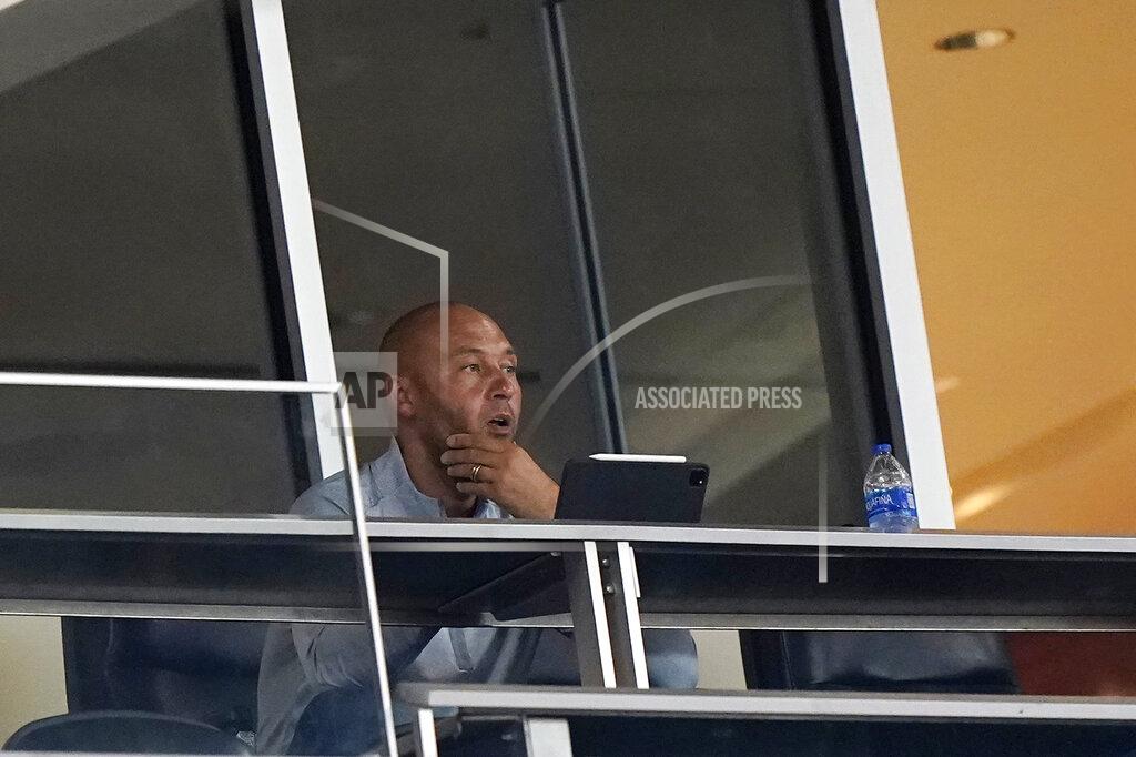 Wilfredo Lee Miami Marlins CEO Derek Jeter watches during the first inning of a baseball game between the Marlins and the Atlanta Braves, Friday, Aug. 14, 2020, in Miami. (AP Photo/Wilfredo Lee)