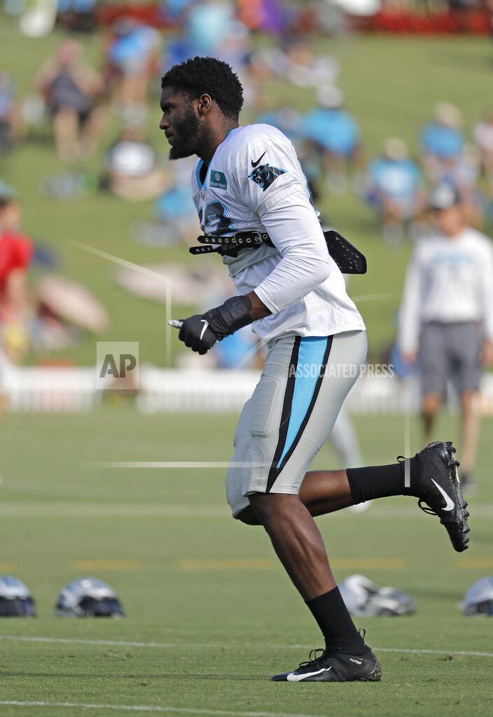Chuck Burton Carolina Panthers' Brian Burns (53) runs a drill during practice at the NFL football team's training camp in Spartanburg, S.C., Sunday, July 28, 2019. (AP Photo/Chuck Burton)